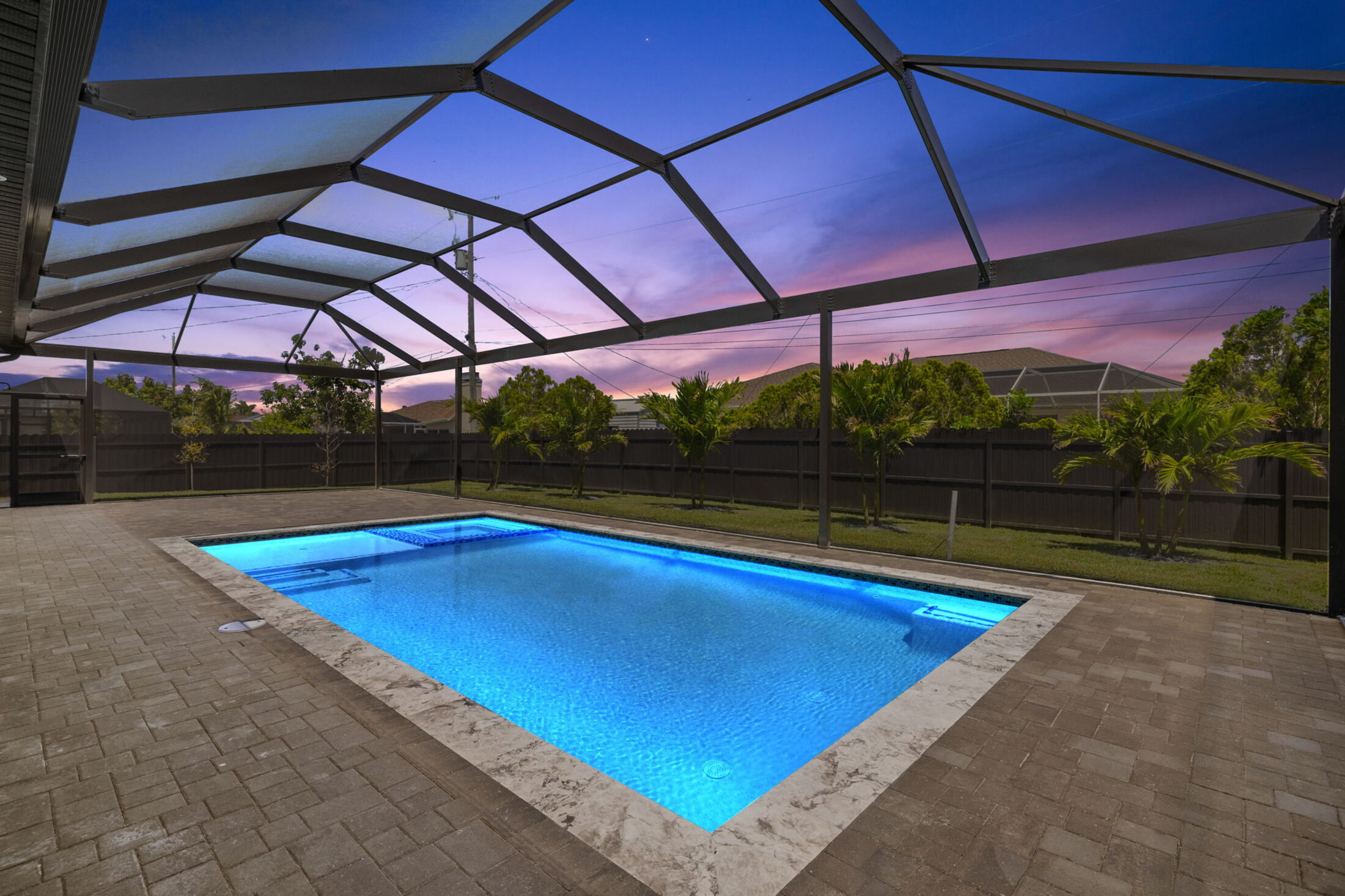 Engineered pool deck at dusk